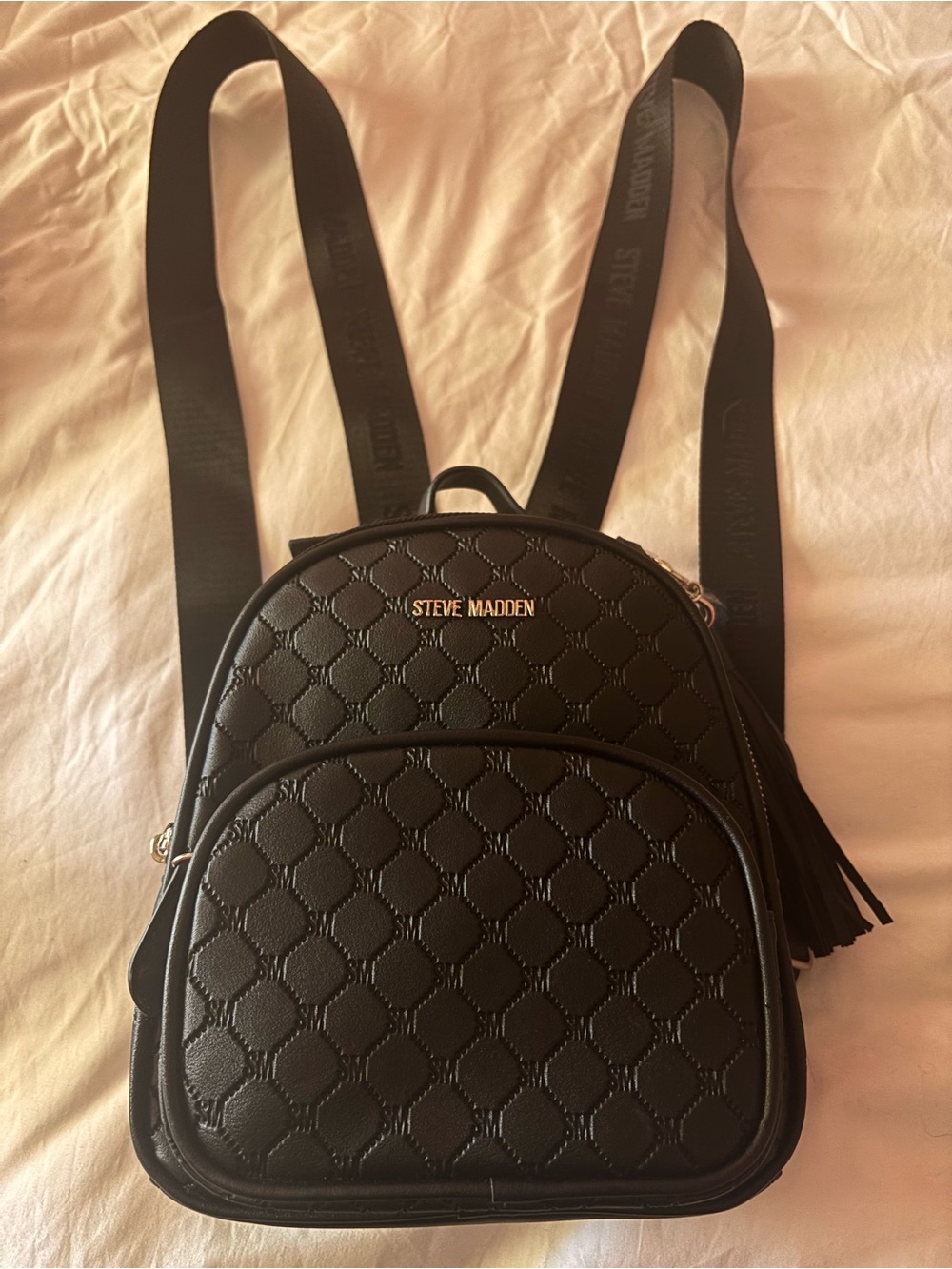 Steve Madden Black Quilted Mini Backpack with Tassel